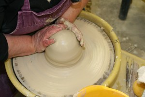 Most important step--"Centering" the clay so there are no wobbles.